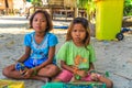 Little girls selling necklaces in Moken tribe Village