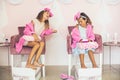 Little girls in spa center having treatment manicure and pedicure Royalty Free Stock Photo