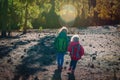 Little girls travel in nature, family hiking in mountains Royalty Free Stock Photo