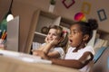 Little girls watching cartoons Royalty Free Stock Photo