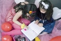 Little girls writing