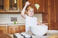 A little good girl bakes tasty cupcakes