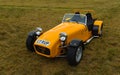 Iconic Yellow Caterham C7 Car isolated on grass. Royalty Free Stock Photo