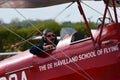 Red Tiger Moth Biplane close Up of Pilot in Flying Goggles,