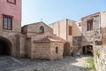 Little Greek Orthodox Church surrounded by residential dwellings in old town. Rhodes, Old Town, Island of Rhodes, Greece, Europe