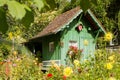 Little green house in garden Royalty Free Stock Photo