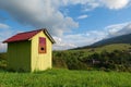 Little green house in mountains Royalty Free Stock Photo