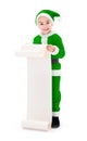 Little green Santa Claus boy showing wish list Royalty Free Stock Photo