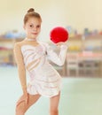 Little gymnast with a ball Royalty Free Stock Photo