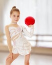 Little gymnast with a ball Royalty Free Stock Photo