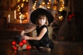 Little Halloween witch reading conjure above pot childhood h