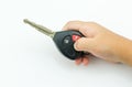 Little hand press unlock on remote control key car Royalty Free Stock Photo