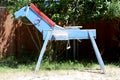 Wooden horse for children learning to ride in a riding school Royalty Free Stock Photo