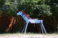 Wooden horse for children learning to ride in a riding school Royalty Free Stock Photo