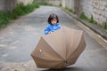 Little handsome baby boy playing with umbrella outdoor Royalty Free Stock Photo