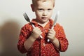 Little Handsome Boy with Fork and Knife.Hungry
