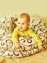 Little happy boy in blankets Royalty Free Stock Photo