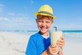 Little boy drinking cocktail on tropical beach Royalty Free Stock Photo