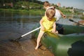 Happy boy swimming in fishing boat Royalty Free Stock Photo