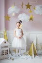 Little happy fairy or angel with magic wand on Holiday theme. Portrait of pretty caucasian little angel wearing white Royalty Free Stock Photo