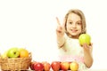 Little happy girl or cute hungry child eating colorful fruit Royalty Free Stock Photo