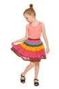 Little happy girl full lenght in colorful skirt, isolated on white background Royalty Free Stock Photo