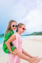 Little happy kids have a lot of fun at tropical beach playing together Royalty Free Stock Photo