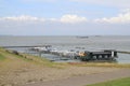 The little harbour in zeeland, holland in summer with high tide