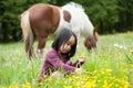 Little horse and asian girl
