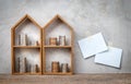 Little house shelf and coins.