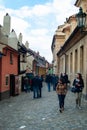 Little houses and tourists on Golden street Royalty Free Stock Photo