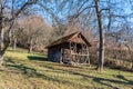 Little hovel in the middle of the garden with grass and trees Royalty Free Stock Photo