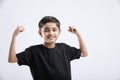 little Indian / Asian boy showing attitude over white background Royalty Free Stock Photo