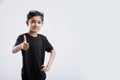 little Indian / Asian boy showing thumbs up