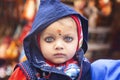 Little Indian child visiting holy lake in Pushkar city