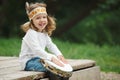 Little Indian girl plays the tambourine Royalty Free Stock Photo