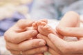 Little infant newborn child in maternity hospital on his fathers