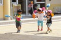 June 2018, Little Japanese boys playing scoops playground outdoors, Takayama, Japan