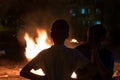 Little jewish boy do bonfire at Jewish holiday of Lag Baomer Royalty Free Stock Photo