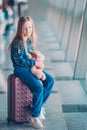 Little kid in airport waiting for boarding Royalty Free Stock Photo