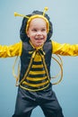 Little kid with a bee costume on carnival. Happy little boy. Close-up. Adorable baby having fun. Funny boy. Happy Royalty Free Stock Photo