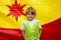 Little kid boy in colorful magician costume. Happy child making circus as school project