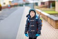 Little kid boy with eye glasses walking from the school Royalty Free Stock Photo