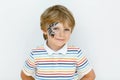 Little kid boy with face painted with a spider web Royalty Free Stock Photo