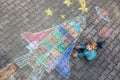 Little kid boy flying by a space shuttle chalks picture Royalty Free Stock Photo