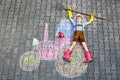 Little kid boy having fun with tractor chalks picture Royalty Free Stock Photo