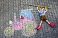 Little kid boy having fun with tractor chalks picture Royalty Free Stock Photo