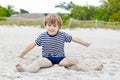 Little kid boy having fun on tropical beach Royalty Free Stock Photo