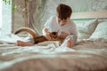 Little kid boy playing with red cat somli breed kitten. People children kids with pets concept. Royalty Free Stock Photo