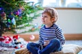 Little kid boy playing video game console on Christmas Royalty Free Stock Photo